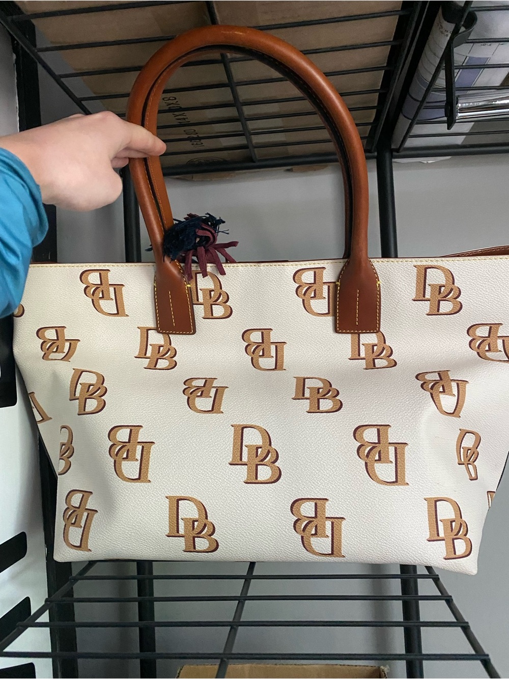 Dooney & Bourke Cream Tote with Tan Leather Handles and Logo Print